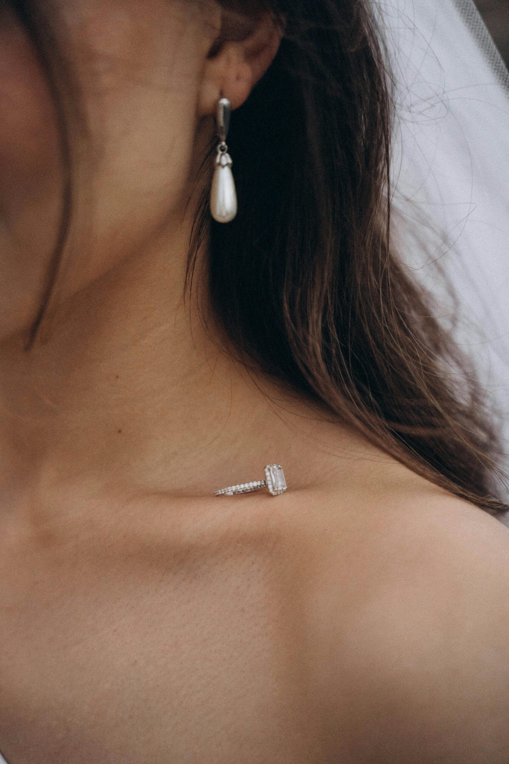 Close-up of a woman wearing freshwater pearl earrings — timeless bridal elegance