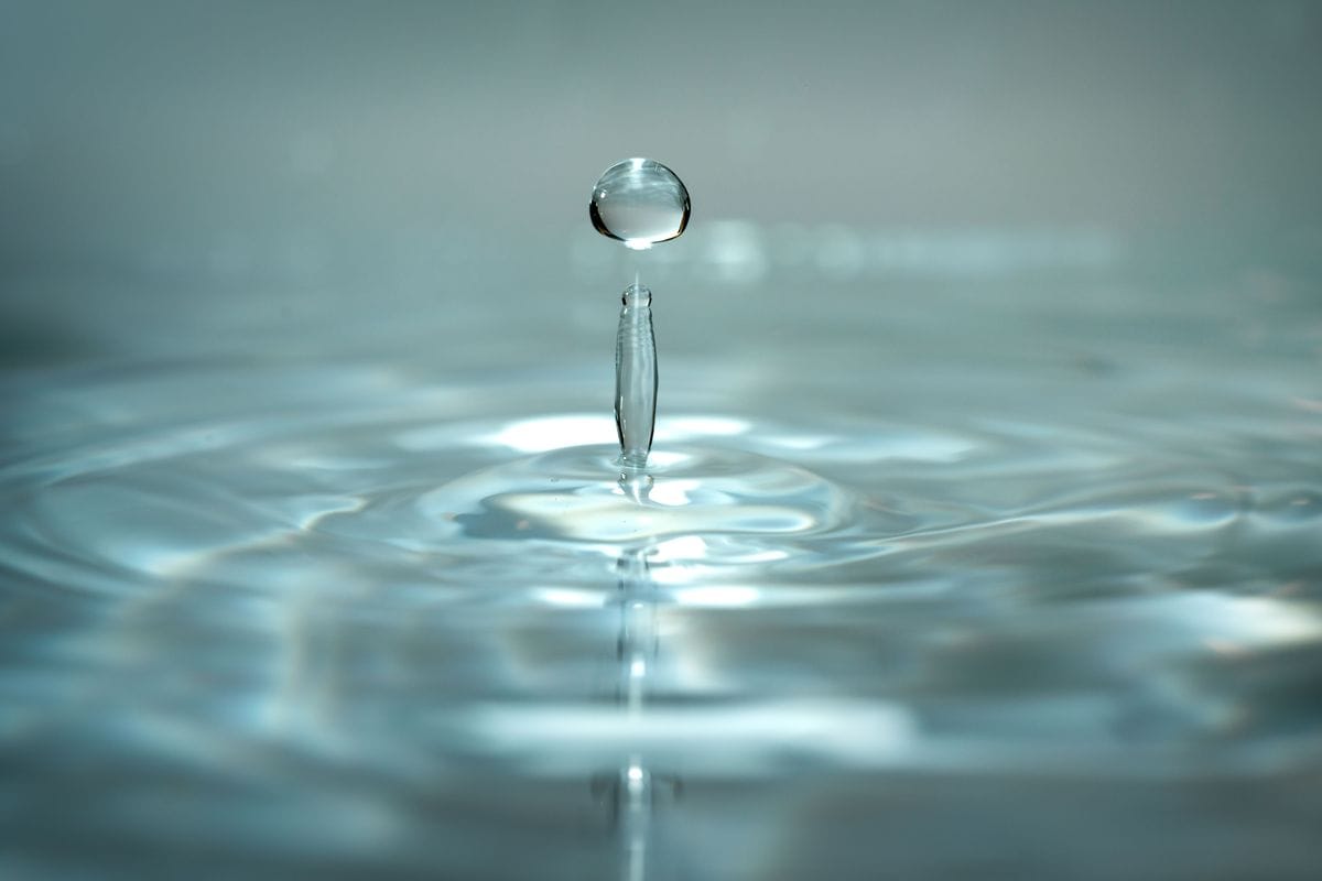 Water droplet ripple detail - pearls and water interaction
