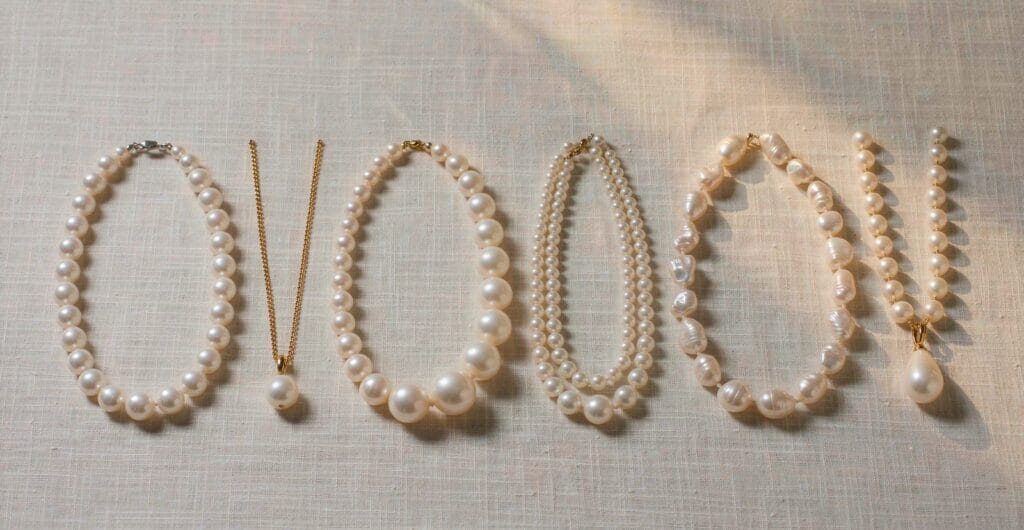 Freshwater pearl necklace styles compared: round strand, graduated, double strand, baroque, teardrop pendant