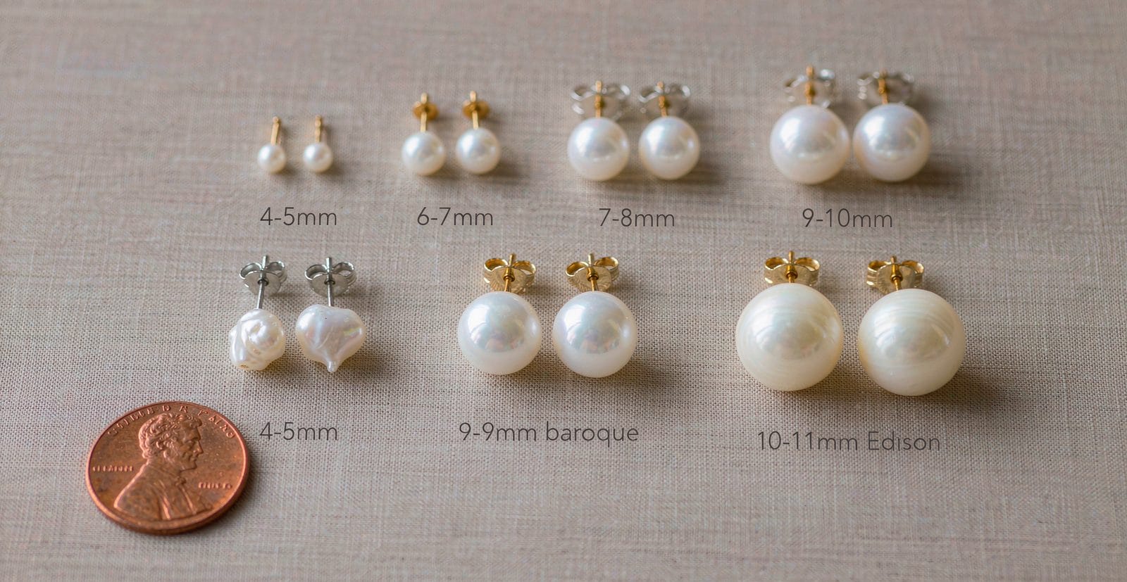 Freshwater pearl stud earrings in sizes 4-5mm to 10-11mm shown with US penny for size reference