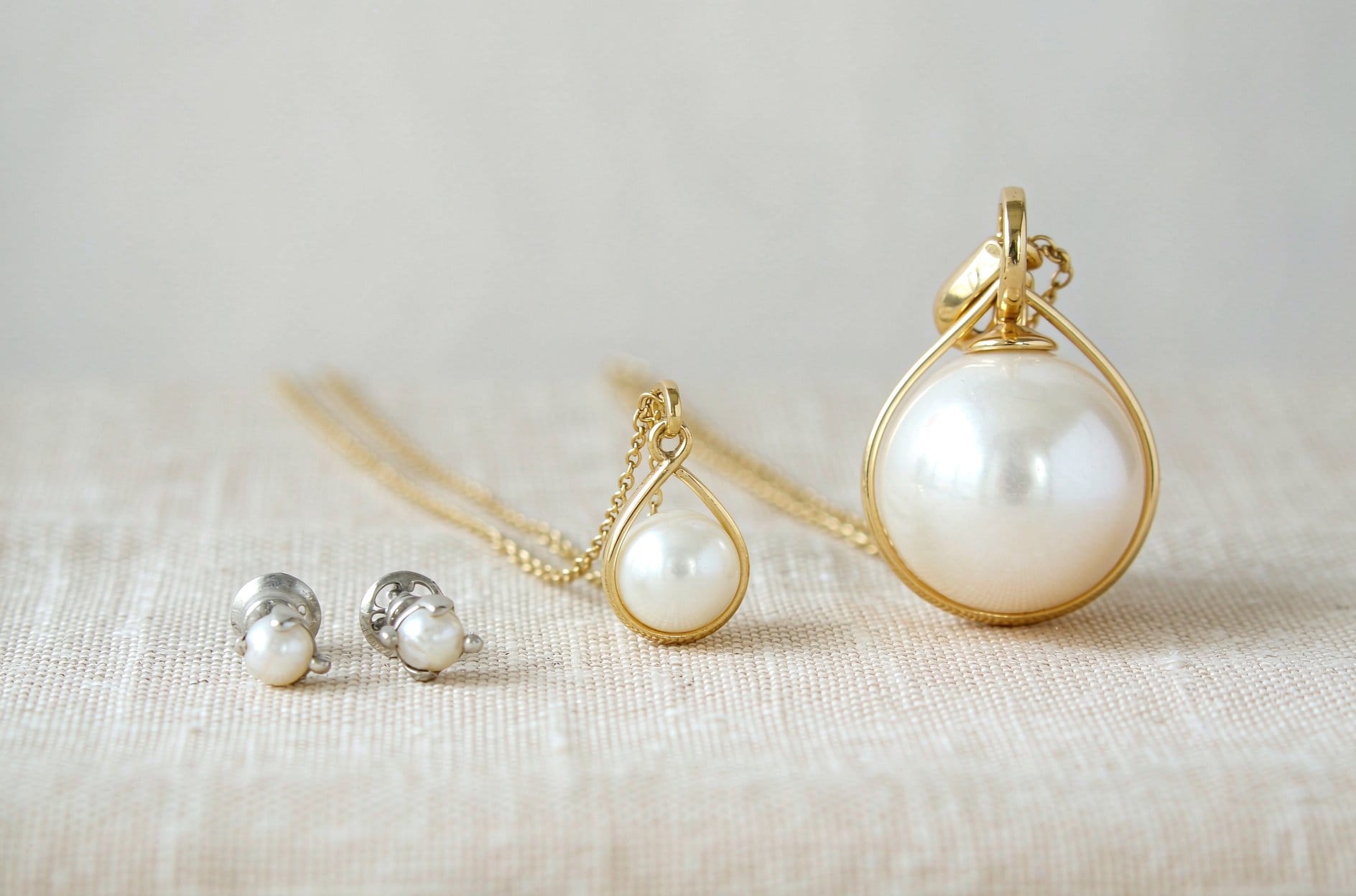 Pearl anniversary gift by style - four jewelry styles including studs, pendant, cluster and solitaire