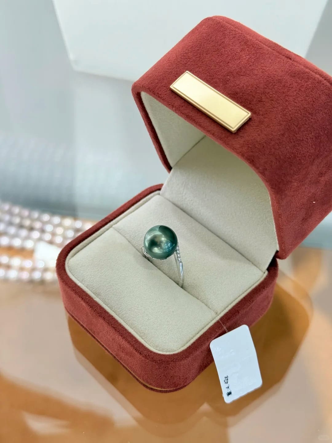 Real Zhuji pearl market gift box with a freshwater pearl ring and price tag for a pearl gift for girlfriend