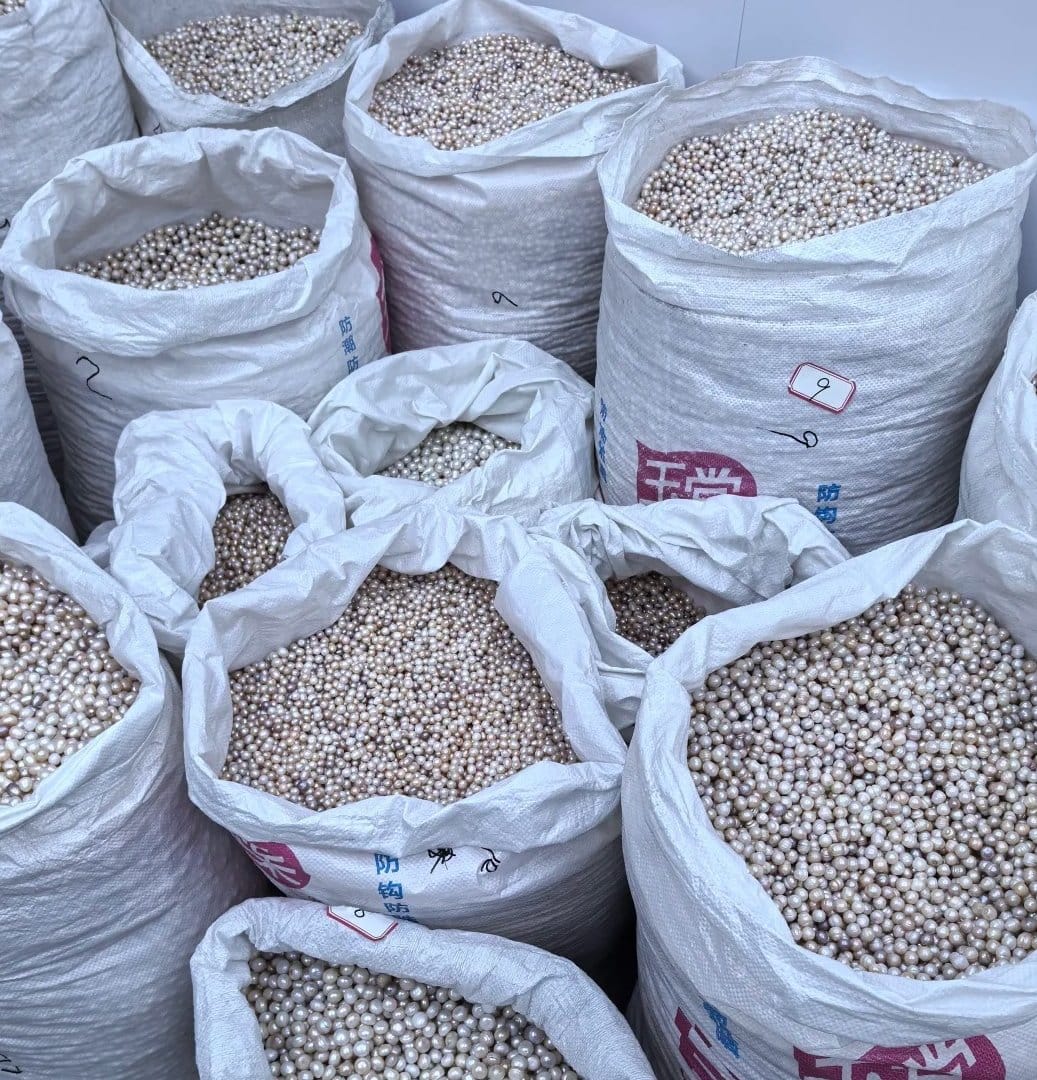 Freshwater pearls scooped by the sack at Zhuji source